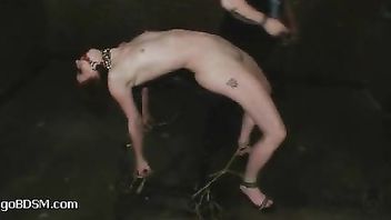 A redheaded pain slut takes ruthless flogging and vibrating
