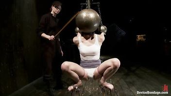 An adorable girlie takes hazardous tortures in tight bondage